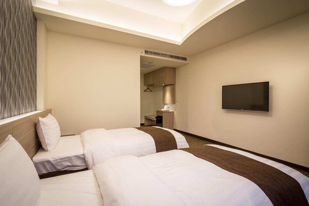 Midu Business Hotel Xiluo Екстер'єр фото
