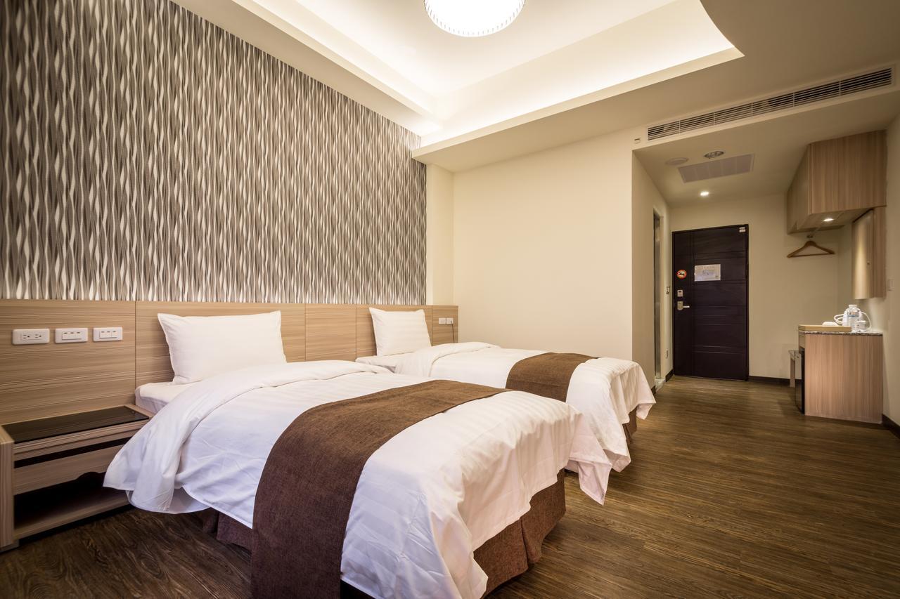 Midu Business Hotel Xiluo Екстер'єр фото