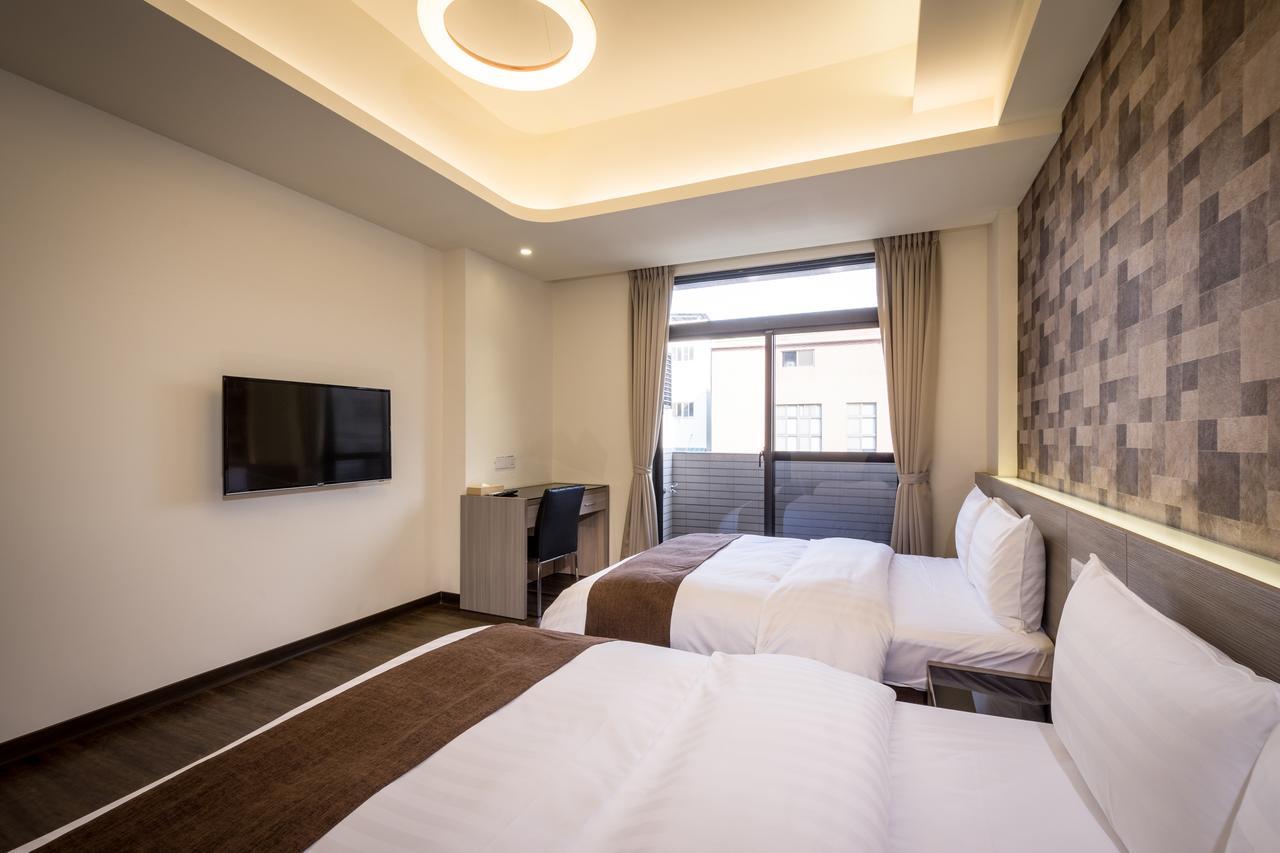 Midu Business Hotel Xiluo Екстер'єр фото